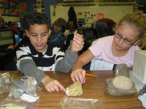 Fourth graders from Patrick Henry Elementary preparing the exhibit