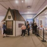 Guests exploring the "City of Sunshine" exhibit.