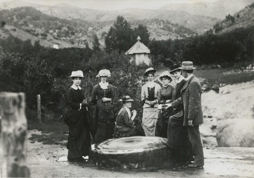 Visitors take in the waters at Manitou's Soda Springs, 1879