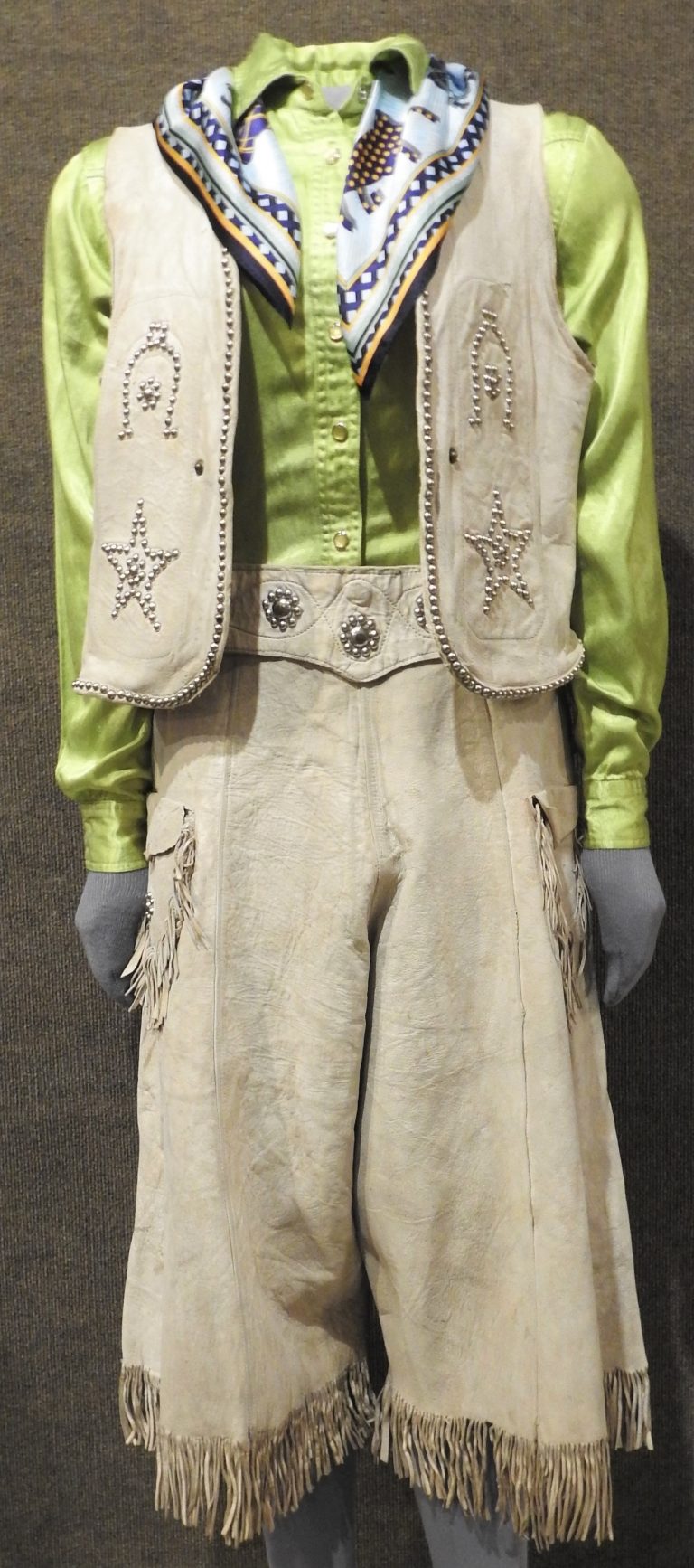 Buckskin Suit Worn by Rodeo Queen Dawn Norris, 1922. Generously Donated by the Family of Dawn Norris, 70-139.