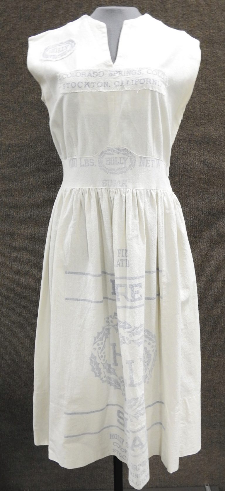 Dress Made from Holly Sugar Sacks, ca. 1945. Generously donated by Dr. Patrick M. Casey, 78-112-3.