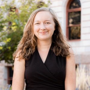 Diane Barber Stine stands in front of the Colorado Springs Pioneers Museum