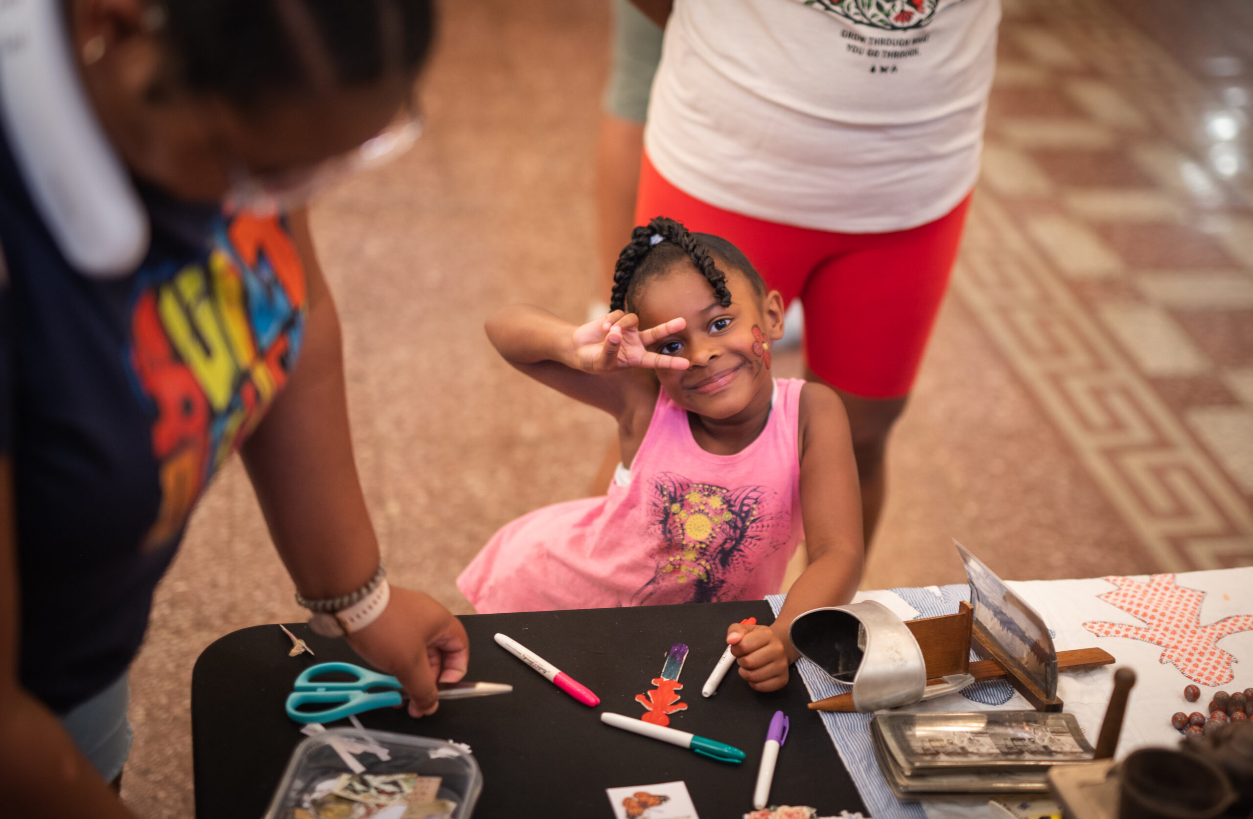 Child creating art at the CSPM.
