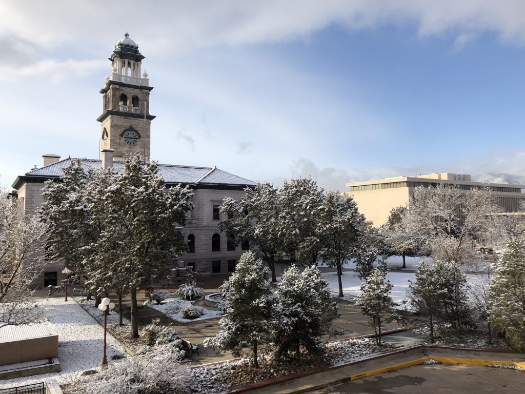 Photo of the historic El Paso County Courthouse covered in snow.