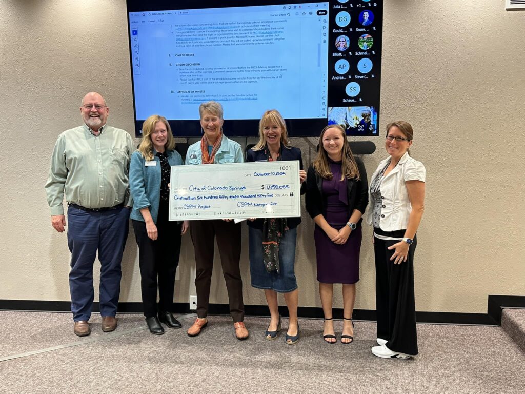 CSPM Board Vice President Nancy Bernard and Fundraising Committee Chair Sandra Meagher presenting the City of Colorado Springs a check for $1.6 million to support the HVAC and Building Restoration Project in October 2024.