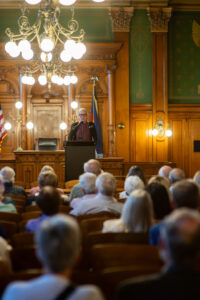 Leah Davis Witherow Curator of History speaking at the 2026 Gift of History event.