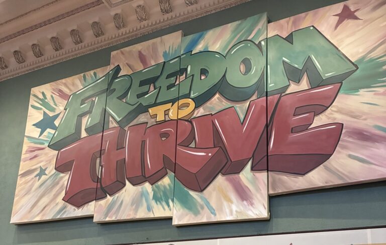 "Freedom to Thrive" exhibit artwork by Johnny Larson.